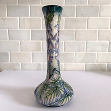 Load image into Gallery viewer, Vintage Sea Drift vase in shape 99/8. Designed by Rachel Bishop in 2002. Numbered edition, 202. This is an absolutely stunning piece, hand painted over slip glaze on a dark blue ground with shades of blue, green purple and creamy white. Produced by Moorcroft Pottery, England. In excellent condition, no chips, cracks or repairs. Production marks on the bottom. In original box. Offered from our personal collection. Measures 3-1/2" x 8"