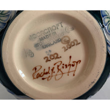 Load image into Gallery viewer, Vintage Sea Drift vase in shape 99/8. Designed by Rachel Bishop in 2002. Numbered edition, 202. This is an absolutely stunning piece, hand painted over slip glaze on a dark blue ground with shades of blue, green purple and creamy white. Produced by Moorcroft Pottery, England. In excellent condition, no chips, cracks or repairs. Production marks on the bottom. In original box. Offered from our personal collection. Measures 3-1/2" x 8"