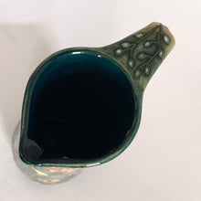 Load image into Gallery viewer, This beautiful "Prairie Summer" ewer pitcher or jug is reminiscent of a summer's day. Designed by Rachel Bishop in 2001 and hand painted over slip glaze on a yellow ground with shades of red, blue, yellow and white on shape JU3. Produced by Moorcroft Pottery, England. In excellent condition, no chips, cracks or repairs. In original box. Purchased directly from the Moorcroft Pottery shop in Stoke-on-Trent, England. Offer from our private collection. Measures 9-1/2"