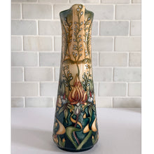 Load image into Gallery viewer, This beautiful "Prairie Summer" ewer pitcher or jug is reminiscent of a summer's day. Designed by Rachel Bishop in 2001 and hand painted over slip glaze on a yellow ground with shades of red, blue, yellow and white on shape JU3. Produced by Moorcroft Pottery, England. In excellent condition, no chips, cracks or repairs. In original box. Purchased directly from the Moorcroft Pottery shop in Stoke-on-Trent, England. Offer from our private collection. Measures 9-1/2"