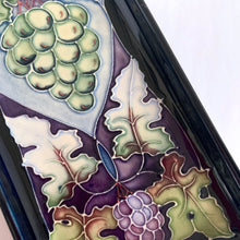 Load image into Gallery viewer, A beautiful hand painted art pottery tray in the "Sonoma" pattern designed by Rachel Bishop in 2003, on shape 965. Hand painted over slip glaze on a dark blue ground in shades of blue, purple, green and brown. Produced by Moorcroft Pottery, England. In excellent condition, no chips, cracks or repairs. First quality. Purchased in person at the Moorcroft Pottery shop in Stoke-on-Trent, England. Maker's marks on the bottom. In original box. Offered from our personal collection. Measures 3-1/2" x 8" x 1/2"