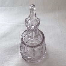 Load image into Gallery viewer, Antique EAPG glass cruet pitcher. Crafted by Flint Glass, USA, early 19th century. The glass has a violet tinge due to the manganese content in the glass which when exposed to sunlight has a tendency to turn violet in colour. A pretty piece!
In used vintage condition, flea bite on the inside rim where the stopper was placed.
Approximately 5 inches tall
