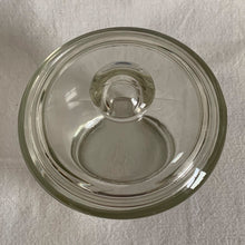 Load image into Gallery viewer, Vintage pressed glass lidded sugar bowl or apothecary jar. Crafted by Jeannette Glass, USA, 1950s. A versatile piece that could be used as a sugar bowl, bath or vanity storage.
In excellent condition, no chips. Marked on the bottom with a 'J' inside a square.
Measures 4 x 4 inches