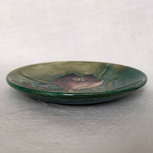 Load image into Gallery viewer, Vintage slip glazed and hand painted "African Lily' art pottery pin dish in tones of teal, green, burgundy and blue. Designed by Walter Moorcroft and produced by Moorcroft Pottery, England, circa 1950 In excellent condition, free from chips/cracks/repairs, crazing present. Impressed with "Moorcroft" and "Made in England". Measures 4-1/2" x 3/4"