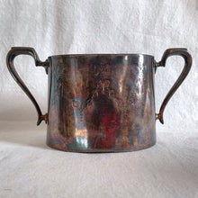 Load image into Gallery viewer, Vintage Victorian style silver plated teapot, creamer and sugar etched with bow and ribbon details and great patina. Ideal for mad hatters tea party, vintage decor or props. Would be perfect for a 'shabby chic' decor scheme or repurposed for a floral arrangement, or redesign as your imagination allows.
Teapot is missing lid finial.
In as found condition.