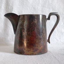 Load image into Gallery viewer, Vintage Victorian style silver plated teapot, creamer and sugar etched with bow and ribbon details and great patina. Ideal for mad hatters tea party, vintage decor or props. Would be perfect for a 'shabby chic' decor scheme or repurposed for a floral arrangement, or redesign as your imagination allows.
Teapot is missing lid finial.
In as found condition.
