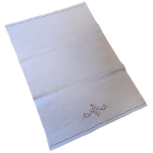 Load image into Gallery viewer, Beautifully stitched vintage embroidered panels on light blue cotton fabric stitched with 3 different designs. Excellent condition. Laundered and steamed. Would make lovely cafe curtains or could be repurposed into pillows, pillowcases or laundry bags.