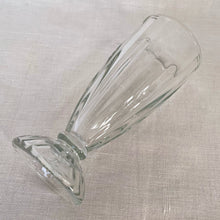 Load image into Gallery viewer, Vintage clear 5110 fluted footed soda fountain glass. Libbey Glass, began making this pattern in the 1950s. Brings back great memories of sipping on creamy milkshakes and floats at the local drugstore. A classic that is always in style!
In excellent condition, no chips.
Measures 3 1/4 x 7 1/2 inches tall
Capacity 12 ounces