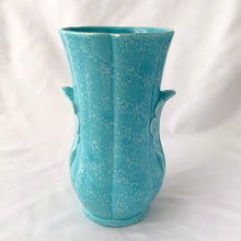 Load image into Gallery viewer, A lovely vintage art deco sky blue and white speckled feminine fluted vase with leaf handles. Crafted by Shorter & Son, England, 1940s. A beautiful vase to use as a decor piece or fill it with a beautiful bouquet of flowers!
In good vintage condition, two flea bites on the rim which aren't too noticeable thanks to the white speckled glaze. No cracks or repairs. Maker's marks.
Measures 5 x 8 3/4 inches