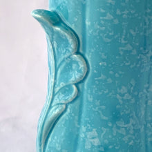 Load image into Gallery viewer, A lovely vintage art deco sky blue and white speckled feminine fluted vase with leaf handles. Crafted by Shorter & Son, England, 1940s. A beautiful vase to use as a decor piece or fill it with a beautiful bouquet of flowers!
In good vintage condition, two flea bites on the rim which aren't too noticeable thanks to the white speckled glaze. No cracks or repairs. Maker's marks.
Measures 5 x 8 3/4 inches