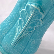 Load image into Gallery viewer, A lovely vintage art deco sky blue and white speckled feminine fluted vase with leaf handles. Crafted by Shorter & Son, England, 1940s. A beautiful vase to use as a decor piece or fill it with a beautiful bouquet of flowers!
In good vintage condition, two flea bites on the rim which aren't too noticeable thanks to the white speckled glaze. No cracks or repairs. Maker's marks.
Measures 5 x 8 3/4 inches
