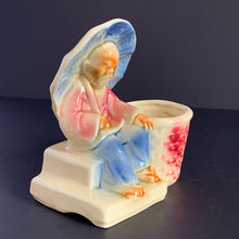 Load image into Gallery viewer, Vintage Chinoiserie style highly detailed ceramic planter featuring an Asian gentleman with umbrella alongside a basket shades of beige, blue and red. Crafted by Shawnee Pottery, USA, 1940s. Perfect for a succulent.
In excellent condition, no chips/cracks.
Measures 5 x 3 1/4 x 5 1/4 inches