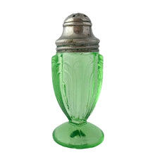 Load image into Gallery viewer, Antique vintage depression era art deco&nbsp; Arches or 50R3506 footed salt or pepper uranium glass shaker with metal lid. Crafted by Hazel-Atlas Glass, USA, 1920s. This timeless kitchen accessory and its novel green uranium glass glows brilliantly under black light, adding a unique accent to your kitchen and table decor!  In excellent condition, no chips. Minor wear to the lid.  Measures 1 1/2 x 3 5/8 inches
