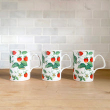 Load image into Gallery viewer, Opposite side view of three Roy Kirkham Alpine Strawberry bone china mugs. displaying red strawberry and green leaf pattern 

