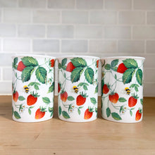 Load image into Gallery viewer, Front view of three Roy Kirkham Alpine Strawberry bone china mugs. displaying red strawberry, bumble bee and green leaf pattern 
