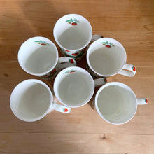 Load image into Gallery viewer, Top-down view into Roy Kirkham Alpine Strawberry bone china mug showing white interior and fine translucent bone china walls
