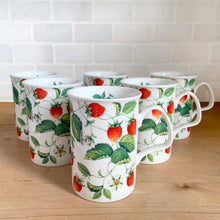 Load image into Gallery viewer, Full set of six Roy Kirkham Alpine Strawberry bone china mugs arranged in a staggered group, handles facing left, showing botanical strawberry and white flower pattern
