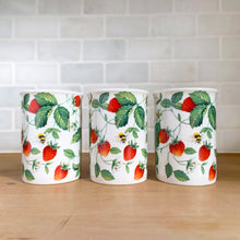 Load image into Gallery viewer, Front view of three Roy Kirkham Alpine Strawberry bone china mugs. displaying red strawberries, flowers, bumble bee and green leaf pattern 
