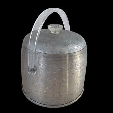 Vintage dome-shaped aluminum ice bucket with clear lucite handle and knob. Crafted by Kromex, USA, circa 1960s. A fabulous example of mid-century design and style!  In used vintage condition with wear to the metal. The handle and knob are in excellent condition. Marked on the bottom, 