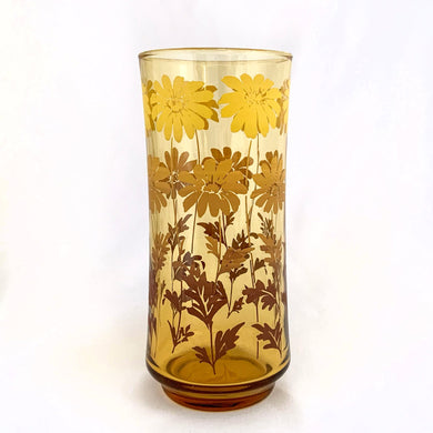 Enjoy a tall cool beverage with this vintage amber cooler-sized glass tumbler decorated with daisy flowers graduating in a colour ombre from coppery brown to golden yellow. Designed and crafted by the artisans at the Libbey Glass Company, USA, circa 1970s. You can almost taste the lemonade!  In excellent condition, free from chips/wear.  Measures 2 5/8 x 6 1/4 inches  Capacity 16 ounces