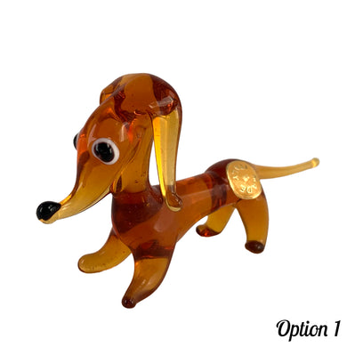 Sweet vintage hand blown amber glass Daschund puppy dog lamp flame work figurine. Crafted in Murano, Italy. A great piece to begin or add to your Murano Glass collection!  In excellent condition, free from chips. Original sticker.  Measures 4 x 1 1/8 x 2 inches   