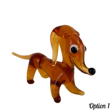 Load image into Gallery viewer, Sweet vintage hand blown amber glass Daschund puppy dog lamp flame work figurine. Crafted in Murano, Italy. A great piece to begin or add to your Murano Glass collection!  In excellent condition, free from chips. Original sticker.  Measures 4 x 1 1/8 x 2 inches   
