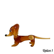 Load image into Gallery viewer, Sweet vintage hand blown amber glass Daschund puppy dog lamp flame work figurine. Crafted in Murano, Italy. A great piece to begin or add to your Murano Glass collection!  In excellent condition, free from chips. Original sticker.  Measures 4 x 1 1/8 x 2 inches   
