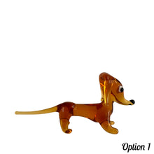 Load image into Gallery viewer, Sweet vintage hand blown amber glass Daschund puppy dog lamp flame work figurine. Crafted in Murano, Italy. A great piece to begin or add to your Murano Glass collection!  In excellent condition, free from chips. Original sticker.  Measures 4 x 1 1/8 x 2 inches   
