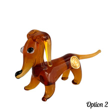 Load image into Gallery viewer, Sweet vintage hand blown amber glass Daschund puppy dog lamp flame work figurine. Crafted in Murano, Italy. A great piece to begin or add to your Murano Glass collection!  In excellent condition, free from chips. Original sticker.  Measures 4 x 1 1/8 x 2 inches
