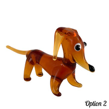 Load image into Gallery viewer, Sweet vintage hand blown amber glass Daschund puppy dog lamp flame work figurine. Crafted in Murano, Italy. A great piece to begin or add to your Murano Glass collection!  In excellent condition, free from chips. Original sticker.  Measures 4 x 1 1/8 x 2 inches
