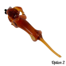Load image into Gallery viewer, Sweet vintage hand blown amber glass Daschund puppy dog lamp flame work figurine. Crafted in Murano, Italy. A great piece to begin or add to your Murano Glass collection!  In excellent condition, free from chips. Original sticker.  Measures 4 x 1 1/8 x 2 inches
