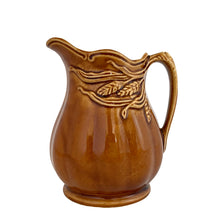 Load image into Gallery viewer, Vintage amber glazed ironstone creamer pitcher featuring a wheat motif. Crafted by Arthur Wood. England. 1950s. Perfect to use as intended or as part of your farmhouse, country and cottagecore decor.

Excellent condition, no chips/cracks/repairs. Crazing present. Marked on the bottom.

Measures 4 2 5/8 x 4 5/8 inches
