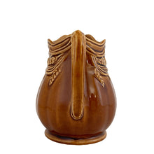 Load image into Gallery viewer, Vintage amber glazed ironstone creamer pitcher featuring a wheat motif. Crafted by Arthur Wood. England. 1950s. Perfect to use as intended or as part of your farmhouse, country and cottagecore decor.

Excellent condition, no chips/cracks/repairs. Crazing present. Marked on the bottom.

Measures 4 2 5/8 x 4 5/8 inches
