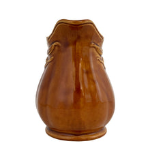 Load image into Gallery viewer, Vintage amber glazed ironstone creamer pitcher featuring a wheat motif. Crafted by Arthur Wood. England. 1950s. Perfect to use as intended or as part of your farmhouse, country and cottagecore decor.

Excellent condition, no chips/cracks/repairs. Crazing present. Marked on the bottom.

Measures 4 2 5/8 x 4 5/8 inches
