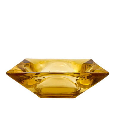 This amber gold square glass ashtray. Crafted by  Anchor Hocking Glass, USA between 1957 - 1965. Perfect for the tobacciana collector!  In excellent condition free from chips.  Measuring 3 3/8 x 1 1/8 inches   