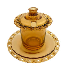 Load image into Gallery viewer, Vintage amber glass lidded marmalade jar and matching underplate both with elegant berry lace edge. Crafted by Rudolfova Glass, Czechoslovakia, 1950s. An lovely addition to your tableware collection, or to give as a gift with a jar of jam, marmalade or honey.

In very good condition, no chips, minor flea bites at the spoon hole.

Jar measures 3 1/2 x 4 inches, underplate 5 1/2 inches
