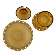Load image into Gallery viewer, Vintage amber glass lidded marmalade jar and matching underplate both with elegant berry lace edge. Crafted by Rudolfova Glass, Czechoslovakia, 1950s. An lovely addition to your tableware collection, or to give as a gift with a jar of jam, marmalade or honey.

In very good condition, no chips, minor flea bites at the spoon hole.

Jar measures 3 1/2 x 4 inches, underplate 5 1/2 inches
