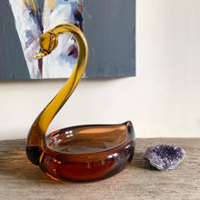 Load image into Gallery viewer, Vintage mid-century hand blown two-tone figural swan art glass candy dish with a rusty orange dish, graceful amber neck and beautifully polished bottom. This piece would have been crafted in either Murano Italy, or Czechoslovakia (possibly David Jones). A beautiful addition to any glass collection! In excellent condition, free from chips. Measures 7 3/4 x 6 1/4 x 9 3/4 inches
