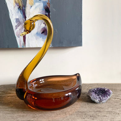 Vintage mid-century hand blown two-tone figural swan art glass candy dish with a rusty orange dish, graceful amber neck and beautifully polished bottom. This piece would have been crafted in either Murano Italy, or Czechoslovakia (possibly David Jones). A beautiful addition to any glass collection! In excellent condition, free from chips. Measures 7 3/4 x 6 1/4 x 9 3/4 inches