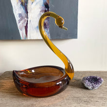 Load image into Gallery viewer, Vintage mid-century hand blown two-tone figural swan art glass candy dish with a rusty orange dish, graceful amber neck and beautifully polished bottom. This piece would have been crafted in either Murano Italy, or Czechoslovakia (possibly David Jones). A beautiful addition to any glass collection! In excellent condition, free from chips. Measures 7 3/4 x 6 1/4 x 9 3/4 inches
