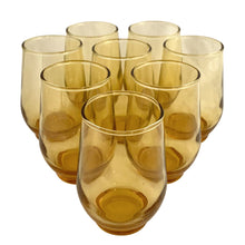 Load image into Gallery viewer, Set of 8 vintage amber Libbey Tempo juice glasses arranged in a triangle, angle front view
