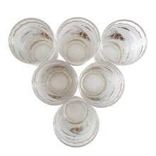 Load image into Gallery viewer, This stunning set of six mid-century era vintage highball glass tumblers are decorated with 22 karat gold angelfish and white seahorses, swimming in a frosted sea of waves with small stylized fish in gold and white in between scalloped gold borders. Crafted by Libbey Glass, USA, 1950s. These beauties will add an exquisite touch of Hollywood Regency style to any occasion - indulge your guests with these truly spectacular cocktail glasses while amping up the glam factor of your bar cart!

