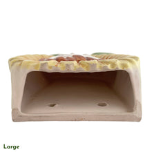 Load image into Gallery viewer, This vintage ceramic wall pocket features a mid-century anthropomorphic hand painted sunflower face, crafted by PY, Japan, 1950s. A must-have for any home decor collector, this charming and highly sought-after piece is sure to add a touch of kitschy cuteness to your space.
In good vintage condition with minor wear to the top of the sunflowers and rim and a small chip on the large one, see photos.

Large measures 5 x 1 3/4 x 7 inches

Small measures 3 1/2 x 1 3/8 x 4 3/4 inches
