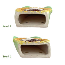 Load image into Gallery viewer, This vintage ceramic wall pocket features a mid-century anthropomorphic hand painted sunflower face, crafted by PY, Japan, 1950s. A must-have for any home decor collector, this charming and highly sought-after piece is sure to add a touch of kitschy cuteness to your space.
In good vintage condition with minor wear to the top of the sunflowers and rim and a small chip on the large one, see photos.

Large measures 5 x 1 3/4 x 7 inches

Small measures 3 1/2 x 1 3/8 x 4 3/4 inches
