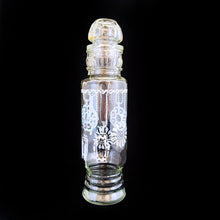 Load image into Gallery viewer, Vintage mid-century clear glass apothecary jar featuring a design of pale blue and white clock or watch pendants. Maker unknown. This versatile jar may be used to store food items in the kitchen, or vanity items in the bath.  In excellent condition, free from chips/wear.  Measures 2 1/2 x 11 inches
