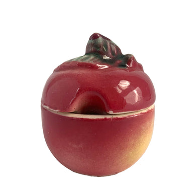 Sweet vintage mid-century era majolica style figural ceramic red apple condiment pot featuring brown branch and green leaves. Crafted by Metroware, Japan, circa 1940s. Perfect for adding kitsch style to your kitchen and table decor! In excellent used vintage condition, free from chips and new cork. Measures 2 x 2 inches