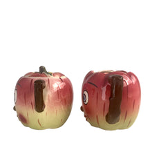 Load image into Gallery viewer, Adorable hand painted anthropomorphic apple face creamer and covered sugar. Crafted by PY, Japan, 1950s. A sweet mid-century kitschy set makes a great addition to your ceramics collection and kitchen decor!

In excellent vintage condition, no chips/cracks, normal crazing present.

Creamer measures 3 3/4 x 3 1/4 inches

Sugar measures 3 1/4 x 3 3/8 inches
