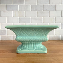 Load image into Gallery viewer, Vintage glossy aqua glaze rectangular ceramic stoneware pedestal planter featuring an impressed pattern. Crafted by Robinson Ransbottom Pottery Co., USA, 1950s. A beautiful piece to add to your art pottery collection and plant up your favourite succulents or houseplant!

In excellent condition, cracks/repairs. There is minor chipping at the corner of the base which appears to have happened during the manufacturing process. Maker&#39;s marks.

Measures 8 5/8 x 5 x 4 3/4 inches
