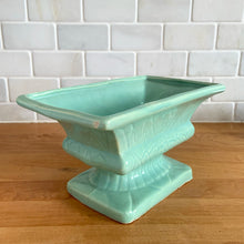 Load image into Gallery viewer, Vintage glossy aqua glaze rectangular ceramic stoneware pedestal planter featuring an impressed pattern. Crafted by Robinson Ransbottom Pottery Co., USA, 1950s. A beautiful piece to add to your art pottery collection and plant up your favourite succulents or houseplant!

In excellent condition, cracks/repairs. There is minor chipping at the corner of the base which appears to have happened during the manufacturing process. Maker&#39;s marks.

Measures 8 5/8 x 5 x 4 3/4 inches
