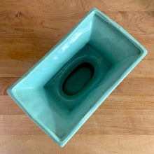 Load image into Gallery viewer, Vintage glossy aqua glaze rectangular ceramic stoneware pedestal planter featuring an impressed pattern. Crafted by Robinson Ransbottom Pottery Co., USA, 1950s. A beautiful piece to add to your art pottery collection and plant up your favourite succulents or houseplant!

In excellent condition, cracks/repairs. There is minor chipping at the corner of the base which appears to have happened during the manufacturing process. Maker&#39;s marks.

Measures 8 5/8 x 5 x 4 3/4 inches
